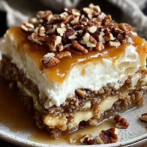 Pecan Pie Lasagna Recipe with layers of graham cracker, cheesecake, and pecan filling